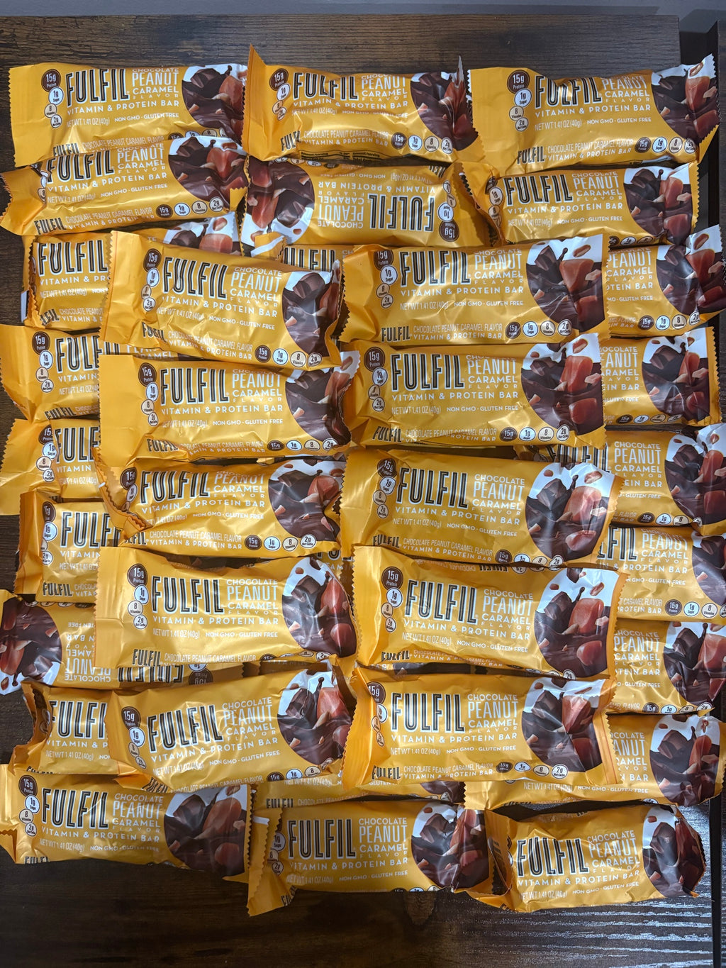 FULFIL Chocolate Peanut Caramel bars laid out in our Brooklyn warehouse