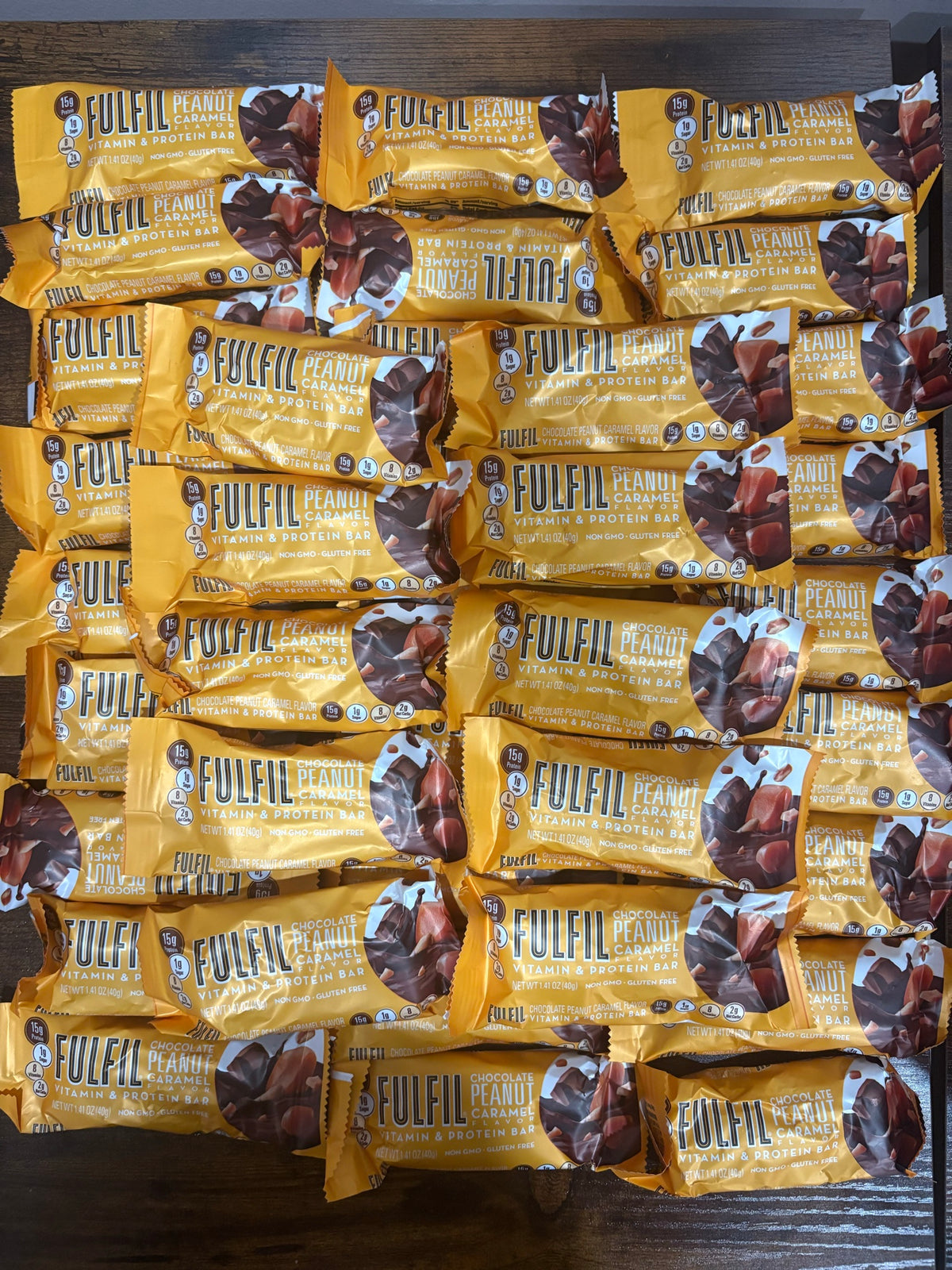FULFIL Chocolate Peanut Caramel bars laid out in our Brooklyn warehouse